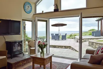 Image de 3 chambres à coucher à Llangennith, near Swansea