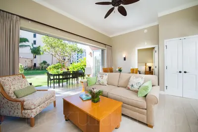 Image de Suite souhaitée au rez-de-chaussée, à quelques pas de la plage et des piscines.