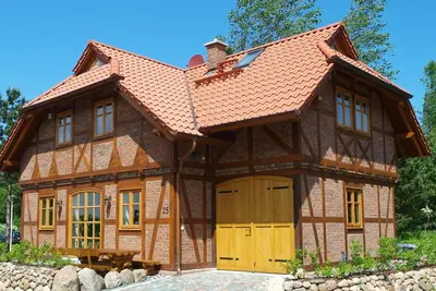 Image de Maison à colombages, directement sur le Wieker Bodden, sauna et cheminée, surf et kitespot