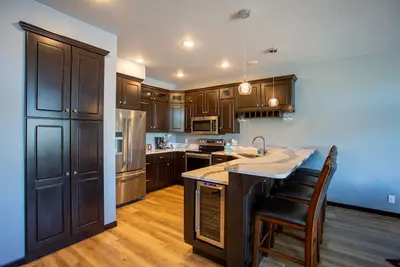 Image de Condo de luxe au bord du lac