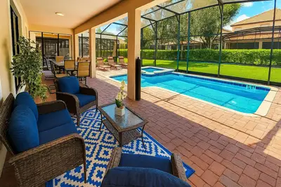 Image de Nouveau ChampionsGate, Superbe villa de luxe de 9 chambres, pour 34 personnes, piscine et spa orientés au sud