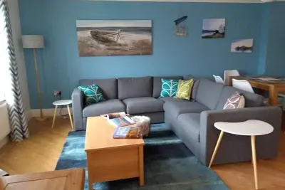 Image de Appartement spacieux au rez-de-chaussée, près de la plage et du golf