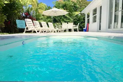 Image de Ocean Breeze Home 5/3 - Piscine chauffée à l'eau de mer - Plage à 3 min. conduire!