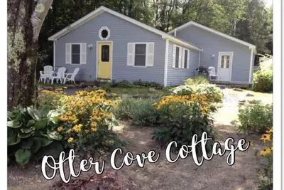 Image de Otter Cove Cottage, à pied d'Otter Cove
