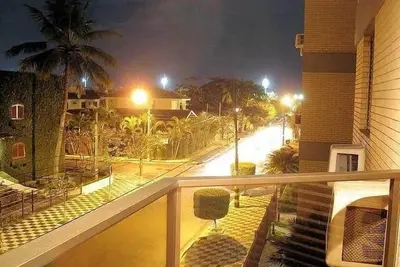 Image de Un pâté de maisons de la plage Cove à Guarujá - 2 suites