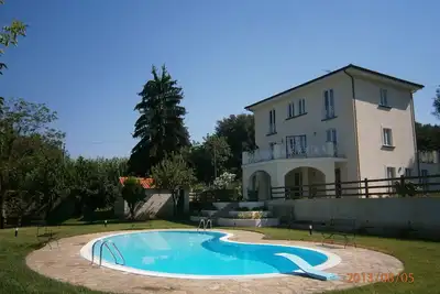 Image de Villa Don Agostino avec piscine entourée de verdure