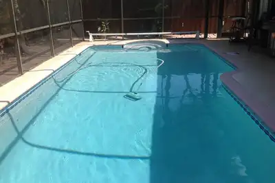 Image de Maison de 3 chambres avec piscine privée d'eau salée chauffée, barbecue, endroit calme