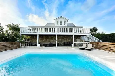 Image de Luxe 5 Br avec plage de sable rose et des vues spectaculaires
