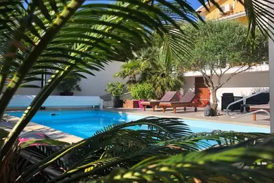 Image de Belle Villa Piscine Chauffee Proche Du Centre Ville  Et Plages