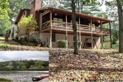 Image de \"Au bord de l'eau\" Chalet de 3 chambres directement sur le lac avec quai.