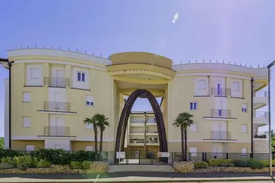 Image de Appartement de vacances avec aire de jeux pour enfants, proche de la plage