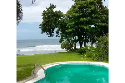 Image de Pied dans le sable dans Guaecá- 4 suites dans une communauté fermée w / 24 heures de sécurité