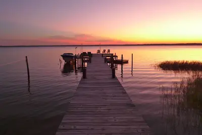Image de Old Florida Sunsets Délices à Lake House retraite avec plage spectaculaire et station d'accueil