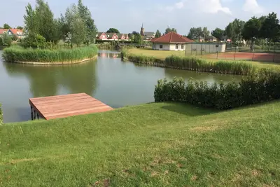 Image de maison de vacances sur l'eau dans le village de vacances Scaldia