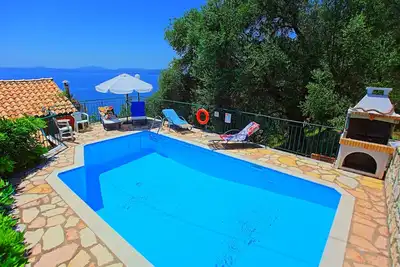 Image de Une vue imprenable, piscine privée, jardin, A / C, WiFi