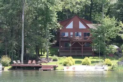 Image de Bord de lac, ponton à louer, bain à remous, salle de jeux, foyer, immense terrasse, kayaks