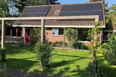 Image de Maison de vacances 'Mimi' avec sauna et 2 min. Marchez depuis les dunes.
