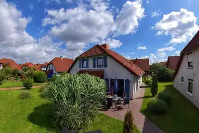 Image de Notre maison jumelée confortable et familiale à Hooksiel vous invite.