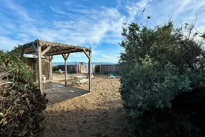 Accès direct à la mer, pieds dans l'eau, climatisé, terrasse, parking gratuit
