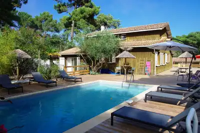 Image de Belle Villa 2 à 12 pers Cap Ferret tout confort piscine chauffée terrasse couv
