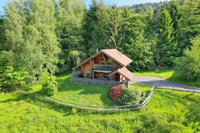 Image de Chalet rondins, jacuzzi et kota-sauna privés, accès piscine, proche de La Bresse