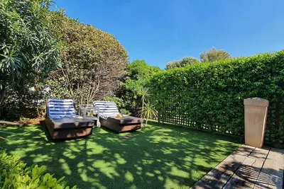 Image de 50 m de la plage<br>Bel appartement en Rdc d'une villa<br>Jardin privatif et parkings