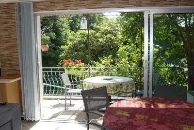 Image de Appartement  50 M²  Climatisee  Vue Sur  Jardin