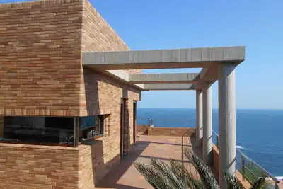 Image de Attique de luxe avec jaquzzi à la terrace et vue panoramique sur mer