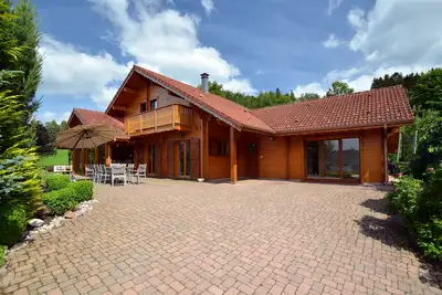 Image de Magnifique chalet 15 personnes à Gérardmer : jacuzzi, baby-foot, sauna