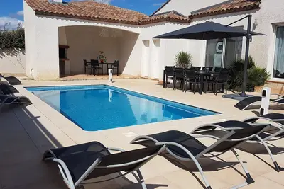 Image de A 5 min des plages🏖️, Villa climatisée, salle de jeux et piscine privée ⭐⭐⭐⭐