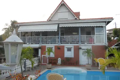 Image de Appartement dans Villa accès jardin, piscine + véhicule au Lamentin (Martinique)