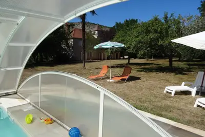 Image de Maison pierre avec piscine et  Spa sur parc d' un hectare à 200m de la Dordogne