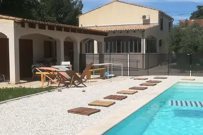 Image de Spacieuse villa de 140 m2  avec piscine