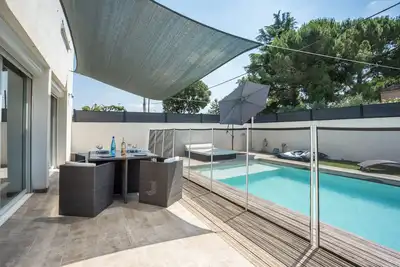 Image de Rez de chaussée villa mitoyenne jardin piscine privatifs-proche mer et golf