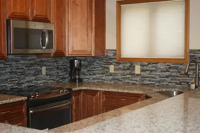 Image de 2 chambres \/ 2. 5 salles de bains Duplex avec club-house avec piscine intérieure et des bains à remous