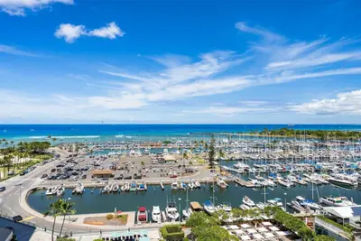 Image de Ilikai 1110 2 chambres avec vue sur l'océan / coucher de soleil / marina