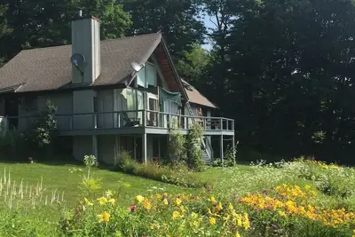 Image de Vue imprenable avec terrasse, étang, colline de traîneau - 100 acres et plus - Idéal pour les familles