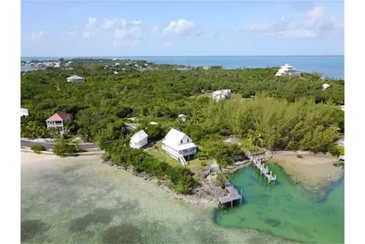 Image de Présenté sur Hgtv! Quai et plage en eau profonde protégés