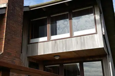 Image de Remodelé la famille Beach House avec Voûtes