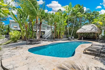 Image de Tropical Temptation 🏖️Canal Front, piscine privée et quai, à quelques pas de la plage