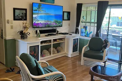 Image de Belle Condo, étapes à la plage, tarifs incroyables, connexion Wi-Fi