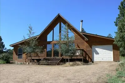 Image de «The Hideaway» - Niché dans la magnifique vallée humide des montagnes.