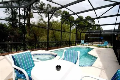 Image de Souvenirs de famille. Piscine privée avec jacuzzi. Ac. Télévision par câble. Wifi gratuit. Salle de jeux