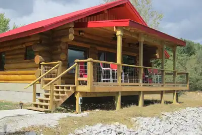 Image de Grandes Cabines De RIVIÈRE En Bois \"Le Nid d'Aigle\"