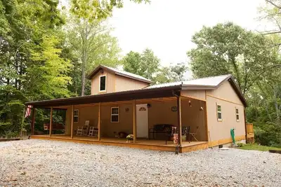 Image de Reece Ridge Cabins. Profitez A, séjour tranquille de détente au premier ministre la cabine de l'Espace.