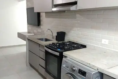Image de Appartement moderne - à 100 mètres de la plage de Pitangueiras - service de plage