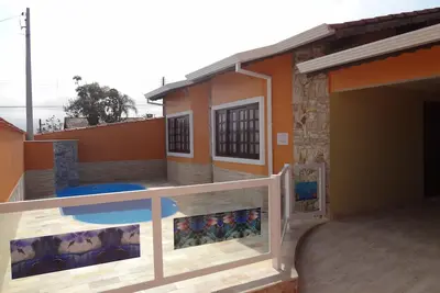 Image de maison w / piscine w / 3 chambres à Peruibe - 1 suite w / Tv par câble et Wi-Fi