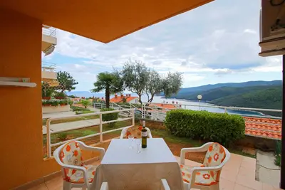 Image de App avec terrasse avec vue sur la mer