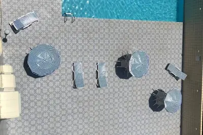 Image de Apt Enseada 2 chambres, 2 salles de bains, air conditionné, piscine, 300 mts. de la plage.