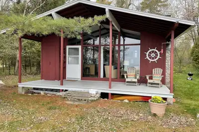 Image de Le chalet sur le lac Michigan – plage de sable, terrain boisé, familial